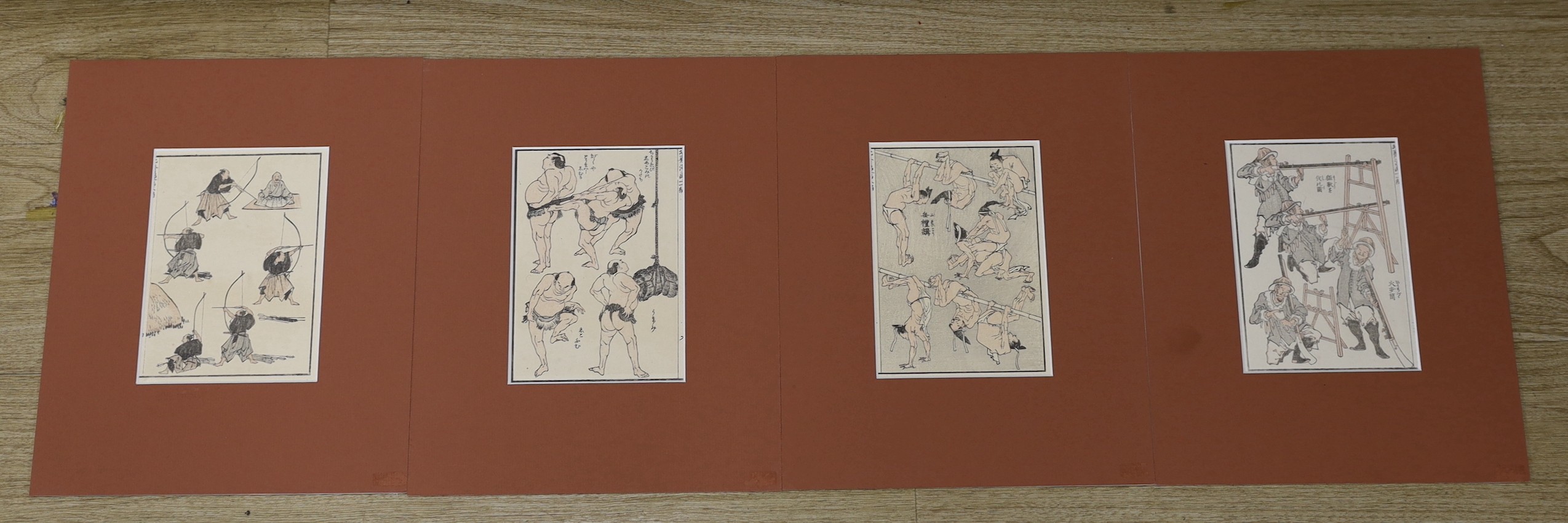Katsushika Hokusai, four Japanese woodblock prints, Warriors with matchlock rifles, archers and wrestlers, 18 x 13cm, unframed